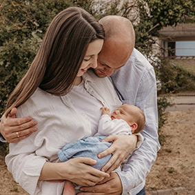 Newborn-Shooting, glückliche Eltern